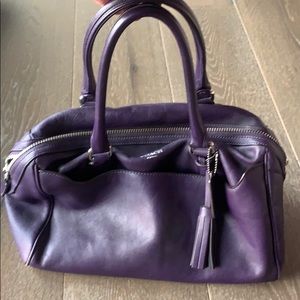 Coach aubergine shoulder bag, with silver details.